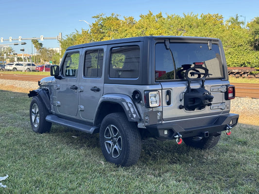 2020 Jeep Wrangler Sahara in gray with a rugged exterior, available as a repairable and salvage car for sale at Salvage Car Deal