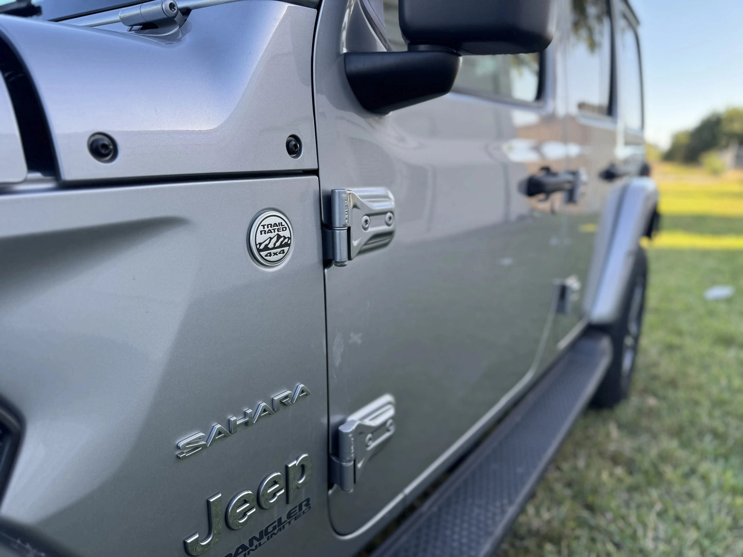 2020 Jeep Wrangler Sahara in silver color, showcasing its iconic features for a repairable & salvage car for sale.